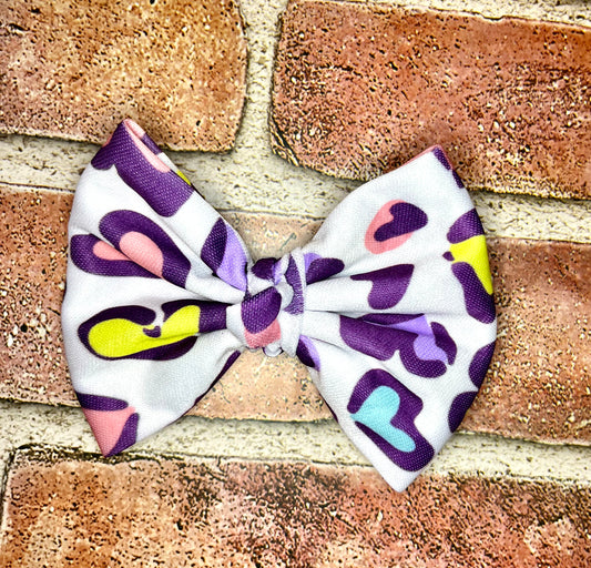 Colorful leopard print fabric bow