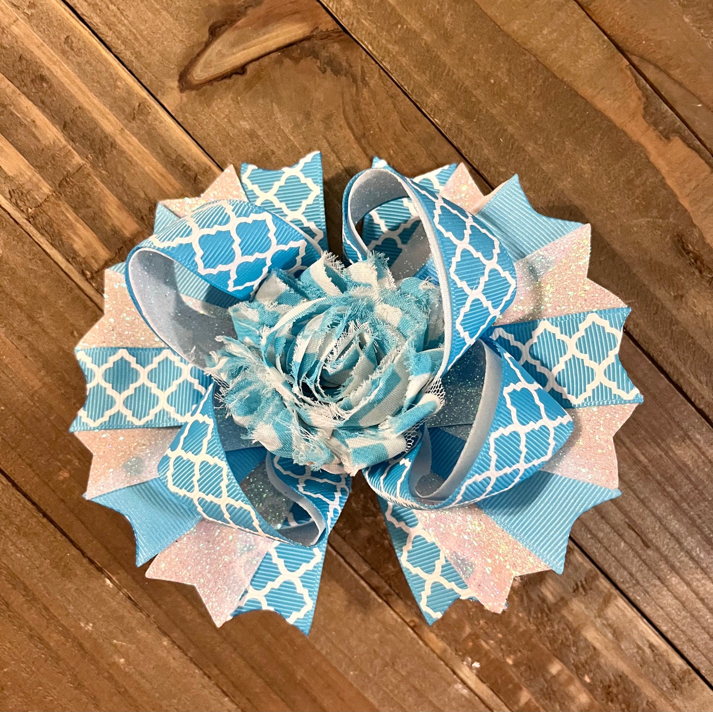 Blue and white printed hair bow